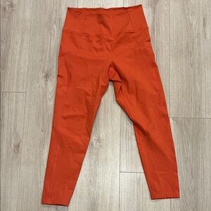 Girlfriend Collective orange leggings